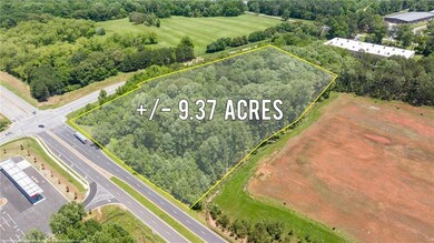 Aerial overview of property's location with property parcel outlined