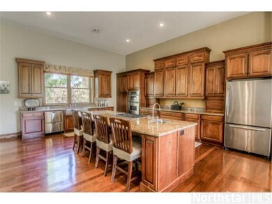Gleaming wood floors and custom cabinets