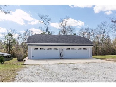 Detached Workshop / 4-Car Garage
