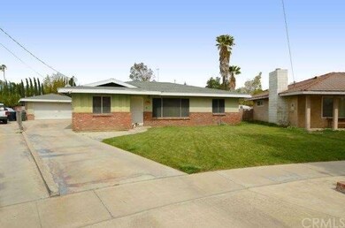 Long driveway with detached garage