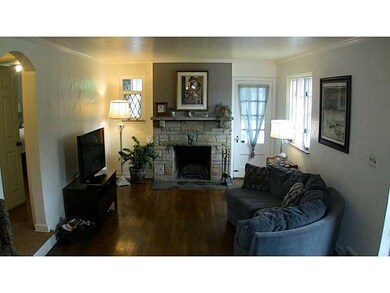 Living Room. Original hardwood floors, stone, log 