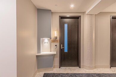 Bathroom featuring tile floors and elevator