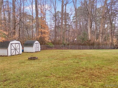 View of yard with a fire pit