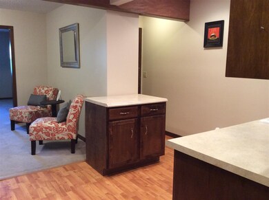 Seller added island for added work space and stora