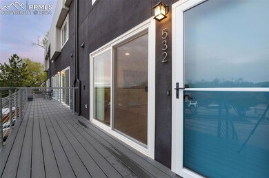 View of deck at dusk