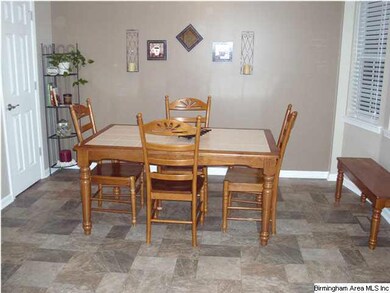 FORMAL DINNING ROOM AT END OF KITCHEN