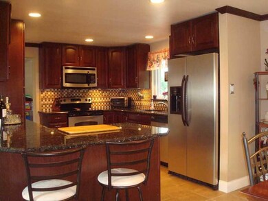 Kitchen. Plenty of counter space and extra seating