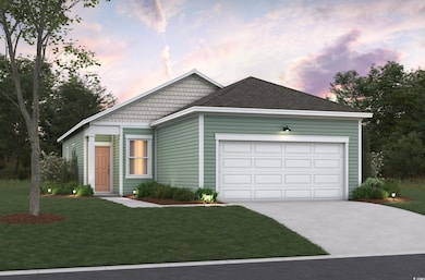 View of front of property with a garage and a lawn