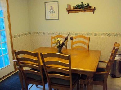 Kitchen dining area with door to deck