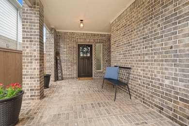 You'll love coming home to this inviting front por
