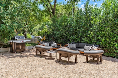 View of patio featuring an outdoor hangout area a