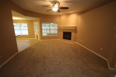 features a plant ledge & spotlights above mantle.