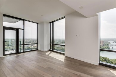 Empty room featuring a wealth of natural light an