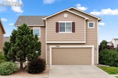 View of front of house with a mountain view, concrete driveway, a garage, and a shingled roof