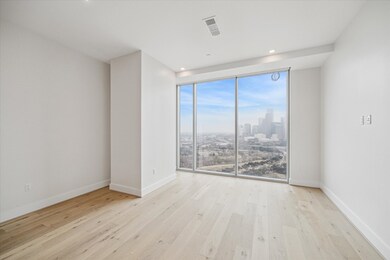 Living room with a downtown view of Houston.
