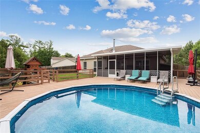 Pool, Back Deck, and Screened-In Back Patio.