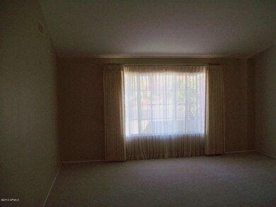 Spacious Living Room has Accent Wall