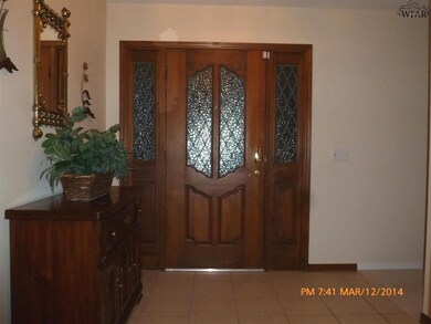 Large Foyer with ceramic tile.