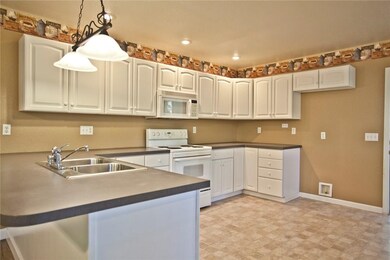 Lots of cabinets for kitchen storage!