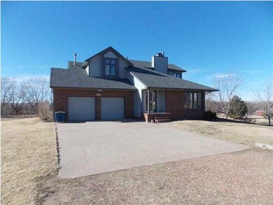 Front of house looking west