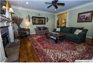 Large family room with hardwood flooring, fireplac