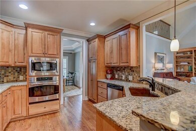 Gorgeous custom kitchen with gas cook top and SS a