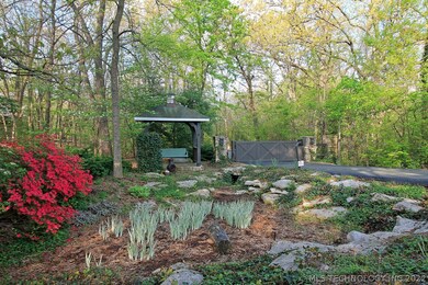 Majestic lakeside private gated entrance boasts a