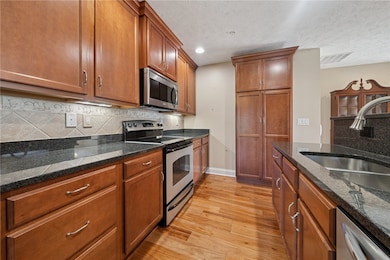 Gorgeous kitchen with stainless appliances, pantry