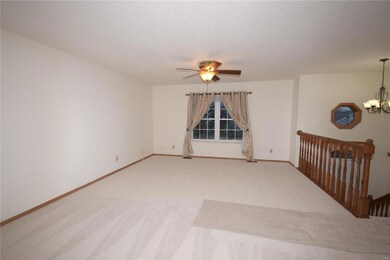 SPACIOUS LIVING ROOM WITH NEW CARPET AND FRESH PAINT