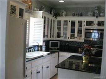 Another view of the kitchen with the window overlo