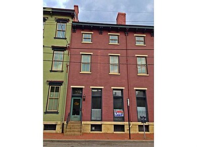 Facade/Exterior Front. 812 Western