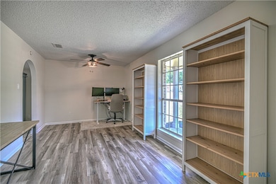 Spacious living area to the right of front door