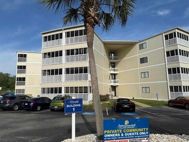 View of building exterior featuring uncovered park