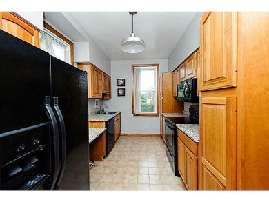 Kitchen. The kitchen features granite tops, tile f