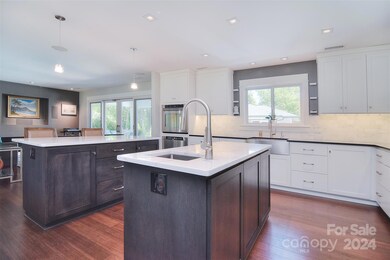 Custom cabinet features include an appliance 