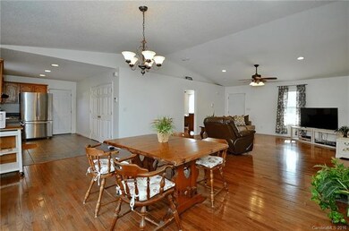 Open floor plan with vaulted ceilings