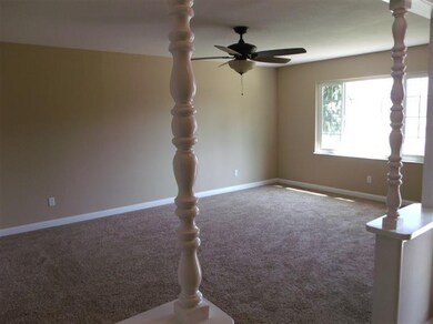 Looking into bonus/living room from entry.