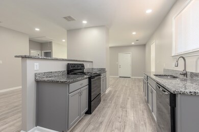 Kitchen featuring light hardwood / wood-style floo