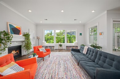 Bathed in natural light, the living room offers ef