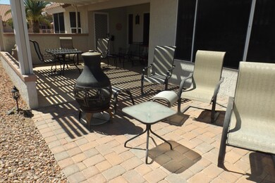 EXTENDED REAR PATIO WITH PAVER FLOORING.