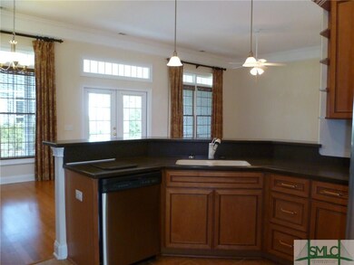 designer kitchen, hardwood floors