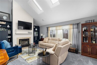 Living Room with gas fireplace and cathedral ceili