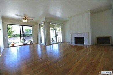 Living room and dining room open to lovely back pa