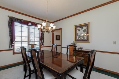 Crown Molding and Chair Rail create Formal Dining 