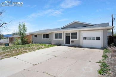 Ranch-style home with stucco siding, fence, concre