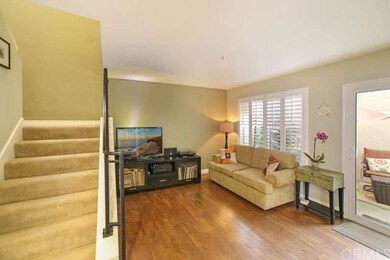 Family room and kitchen are open and light