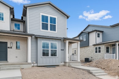 View of front facade with board and batten siding