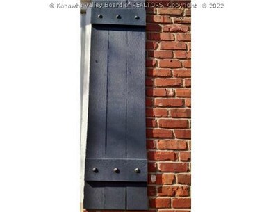 Exterior Front. Beautiful Brick and  New Custom Wo