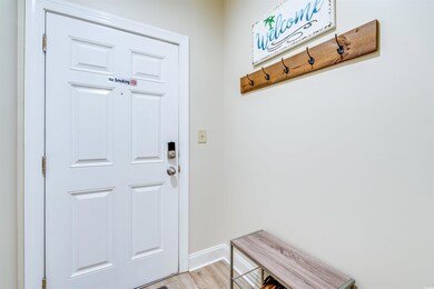 Mudroom with light hardwood / wood-style flooring