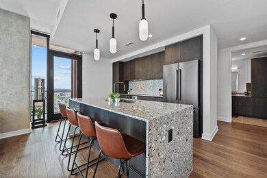 Kitchen with freestanding refrigerator, baseboard